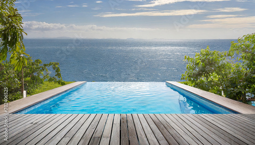 Vacant wooden deck featuring a swimming pool
