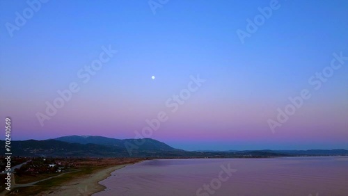 Drone video of a flight over the coast of Nea Kerdylia, Greece during sunset