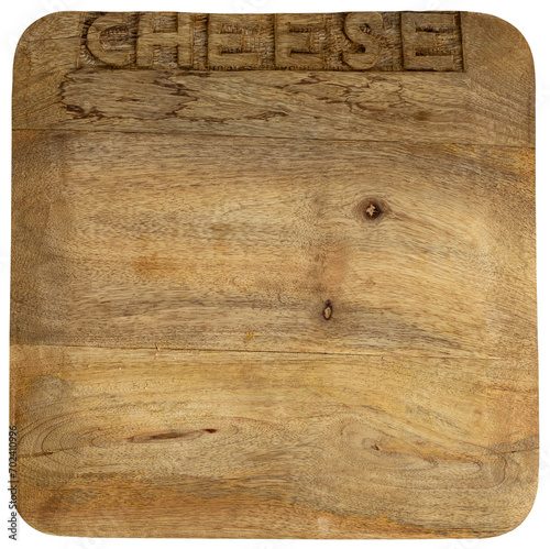 Wooden cutting board with carved word cheese isolated. Front side. Top view.