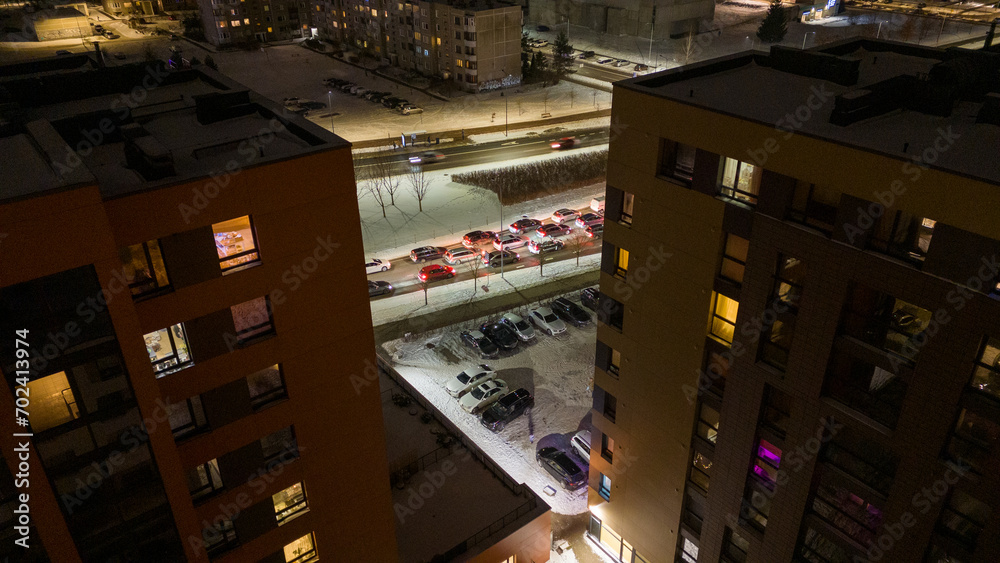 Drone photography of multistory houses in a city during night