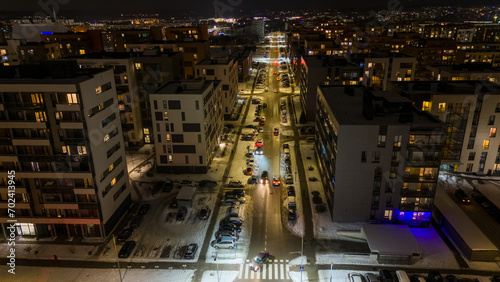 Drone photography of multistory houses in a city during night © M