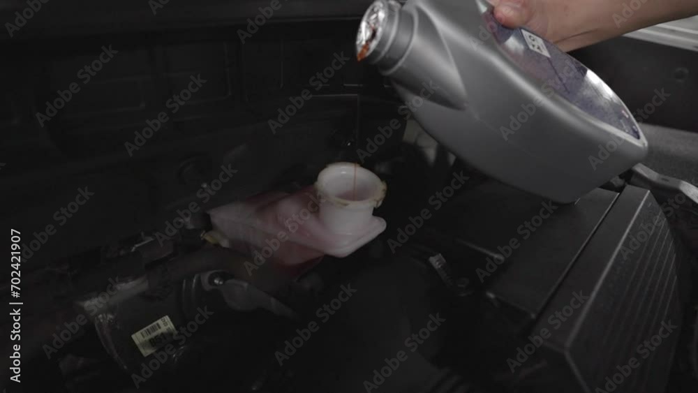 Close up footage of a Maintenance Car service - auto oil change, motor check, brake cleaning, tire check, engine inspection, motor oil-brake inspection
