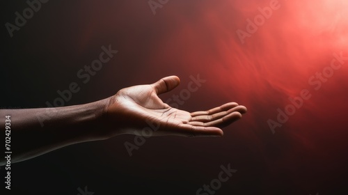 Hand reaching out for help, symbolizing mental health support photo