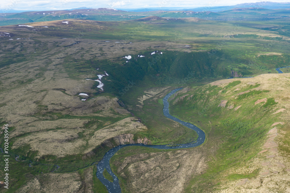 Iliamna River in southwest Alaska, at the north end of the Alaska Peninsula. Aerial view of rugged and remote Alaska. 