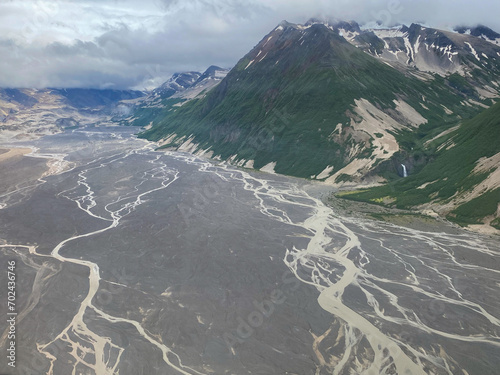 Ukak River drains off the ash field of Valley of Ten Thousand Smokes in Katmai National Park and Preserve. Braided river is rich with ash deposits from 1912 Novarupta volcano eruption.  photo