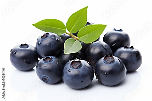 Fresh and delicious ripe huckleberry berries prominently showcased on a pristine white background