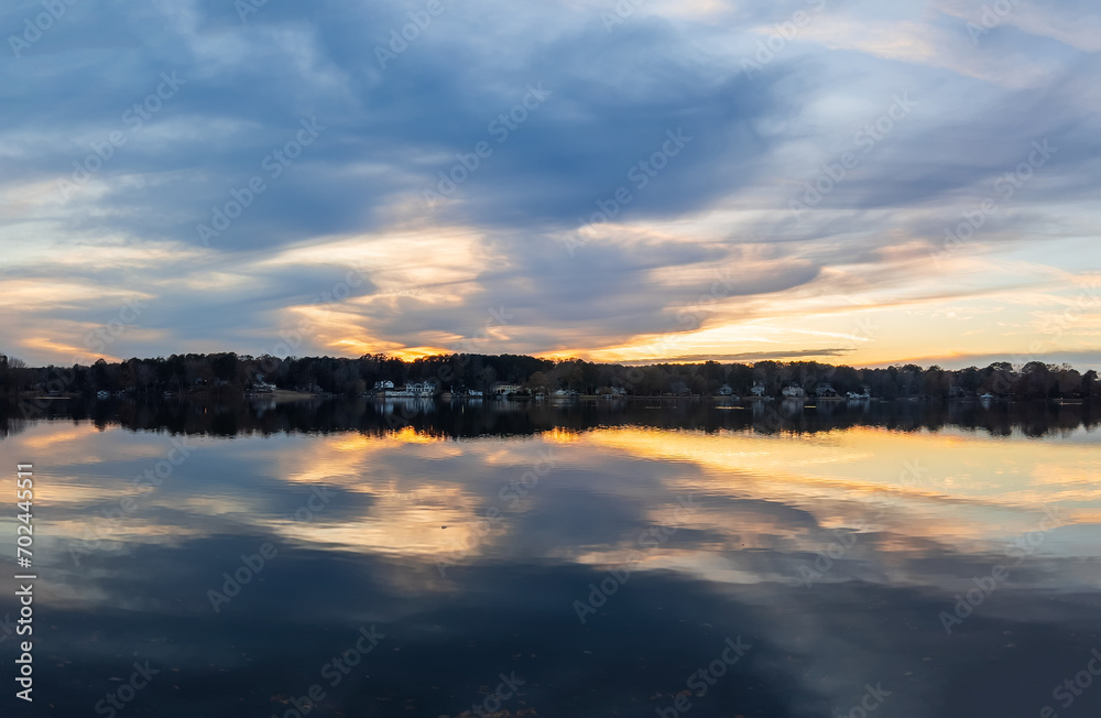 Beautiful lake with reflections in the water at sunset with spectacular colors. landscape photography