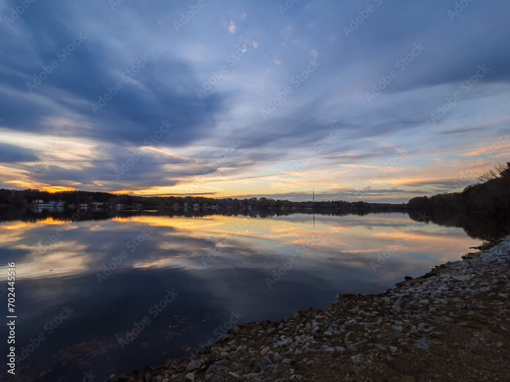Beautiful lake with reflections in the water at sunset with spectacular colors. landscape photography
