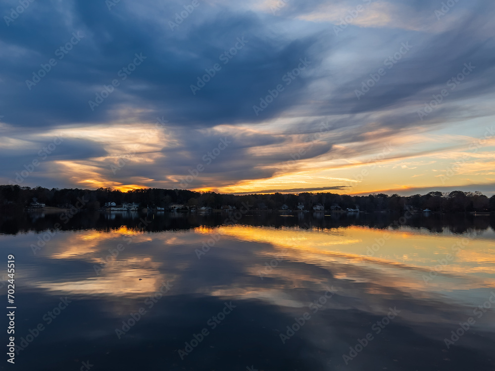 Beautiful lake with reflections in the water at sunset with spectacular colors. landscape photography