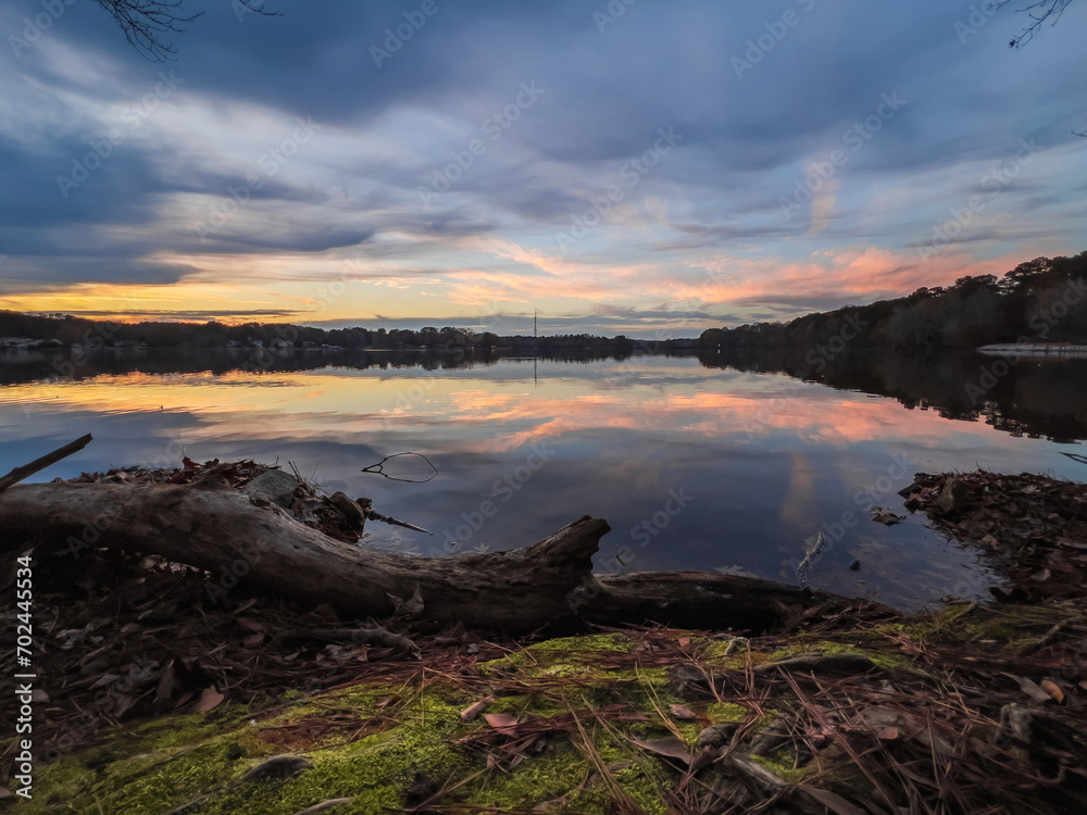 Beautiful lake with reflections in the water at sunset with spectacular colors. landscape photography