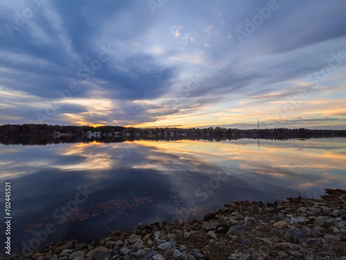 Beautiful lake with reflections in the water at sunset with spectacular colors. landscape photography