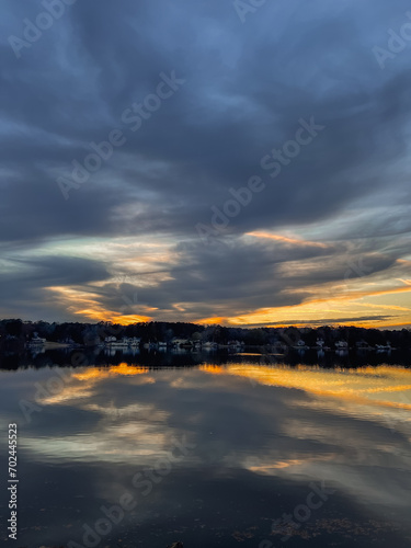 Beautiful lake with reflections in the water at sunset with spectacular colors. landscape photography © jeanpierre