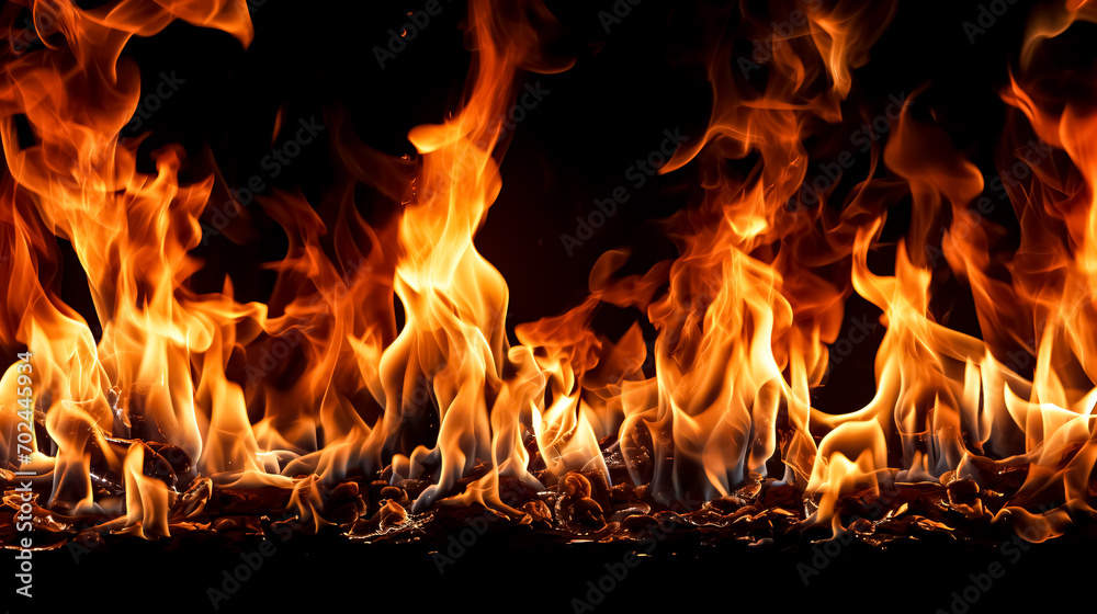 Fire flames isolated on black background. Realistic fire flames texture. Fire flames isolated on black background. Realistic fire flames texture.