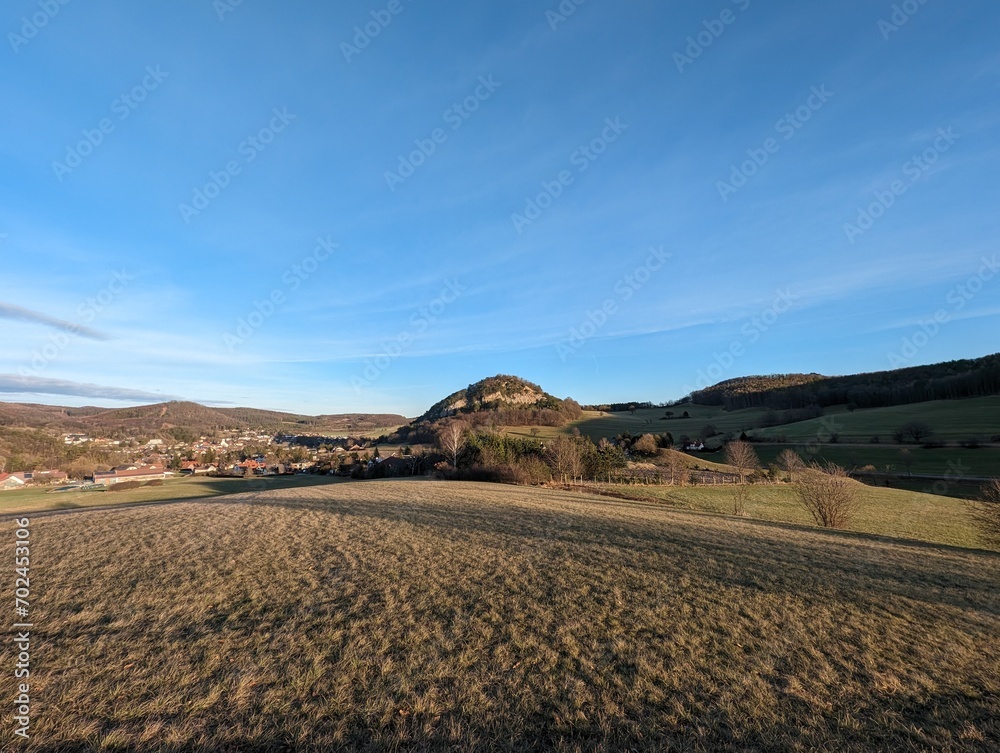 View to Allands iconic mountain: Buchberg. Idyllic landscape with blue sky in Alland, Lower Austria