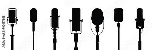 Set of black silhouettes of microphones. Vector microphones on a white background. Classic instruments symbols for store, conversation genre, podcast or music app.
