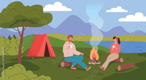Couple of woman and man rest in a tent in nature in the summer © HilaryDesign