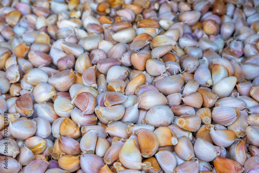 Many Garlic Cloves up for sale in Thailand market place. Many Garlic Cloves up for sale in Thailand market place.