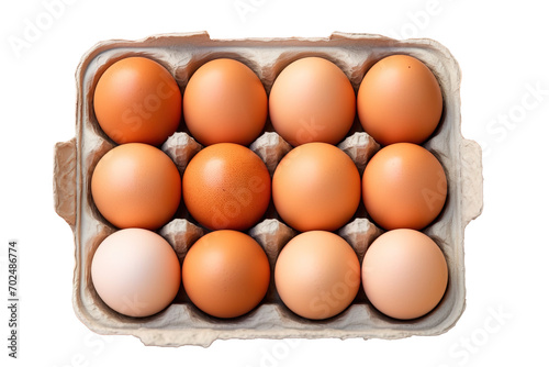 Top view of dozen of eggs in cardboard box over white transparent background