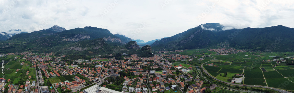 Aerial view of Arco village and his Arco castle on high rock view, Sarca Valley, Trentino Alto Adige region of Italy . Arco, Trento, Italy