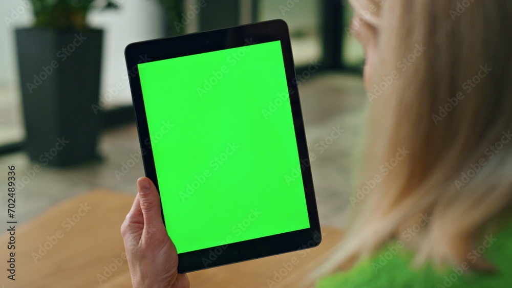 © stockbusters - Closeup woman working chromakey computer indoors. Businesswoman gesturing hands