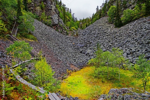 Isokuru gorge with scree-covered slopes, autumn atmosphere, wooden stairs as an ascent aid in the scree, Northern Finland, Finland, Europe photo