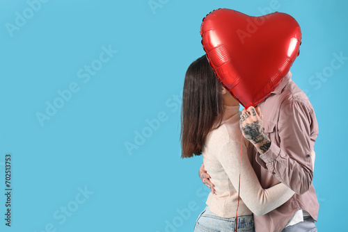Couple with heart-shaped ai...