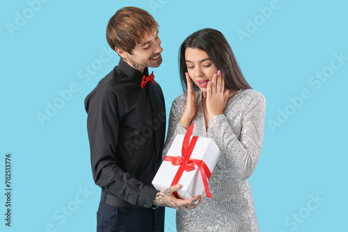 Surprised woman receiving g...