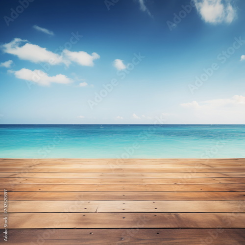 Wooden dock over calm blue ocean with fluffy white clouds in the sky