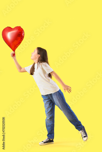 Cute little girl with heart...