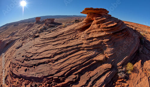 Canvas Print Stone hoodoo with wavy sandstone at Ferry Swale near Page AZ
