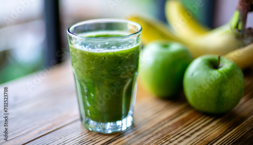 Fresh green smoothie in glass, ideal morning detox drink, healthy lifestyle concept, vibrant colors, nutritious beverage