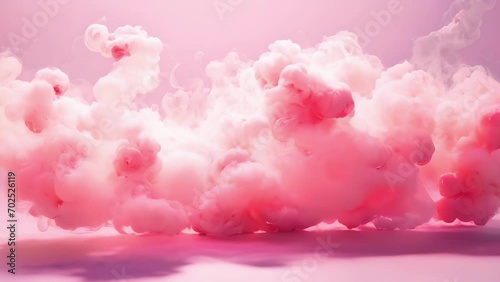 A trail of heartshaped bubbles waft out of a swirling cloud of pink smoke, as the love potion is prepared. photo