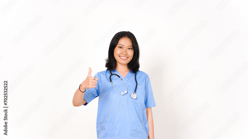 Young Asian female doctor showing thumbs up isolated on white background Young Asian female doctor showing thumbs up isolated on white background
