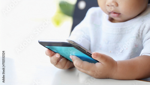 baby hands using smartphone 