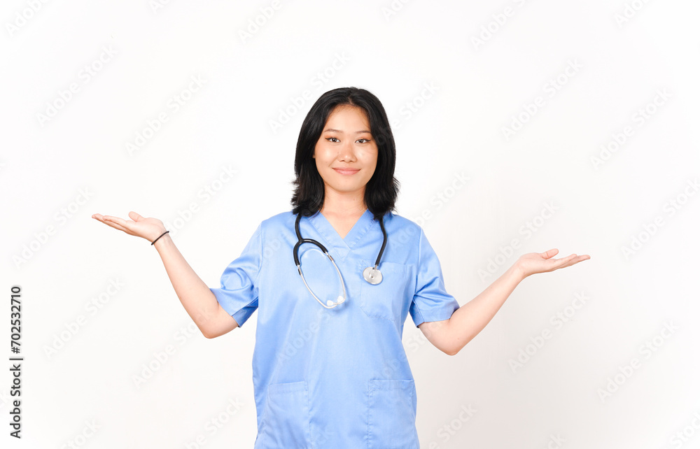 Young Asian female doctor showing copy space on two open palm isolated on white background Young Asian female doctor showing copy space on two open palm isolated on white background