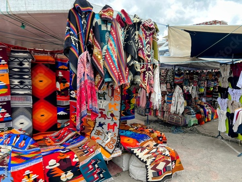 Otavalo, Ecuador  10-18-2023  Views of the colorful indigenous market which includes handmade items like ponchos, sweaters, and shawls. photo