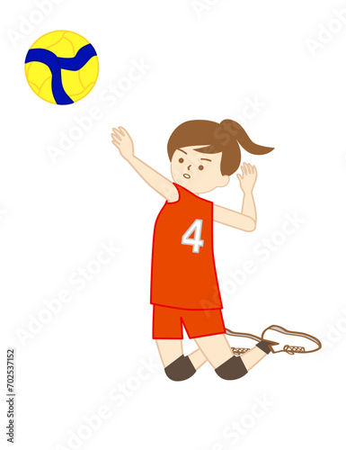 バレーボールの試合で全身を使って右手でアタックをする女の子(左向き)