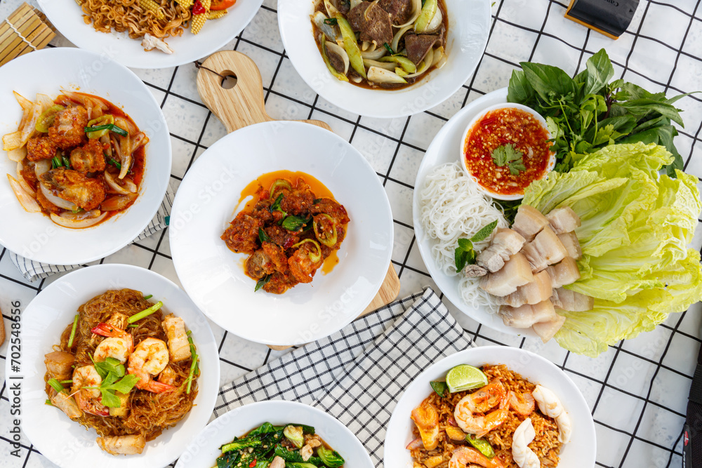 variety of Thai food Including menu Miang, crispy pork, steamed shrimp with vermicelli