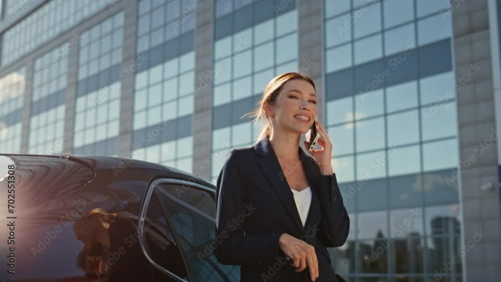 Rich woman talking smartphone leaning on expensive auto close up zoom in. Rich woman talking smartphone leaning on expensive auto close up zoom in.