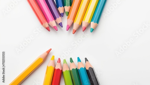 Colorful Pencils Arranged on a White Background