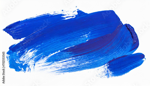 Blue strokes of gouache paint brush on a white isolated background photo