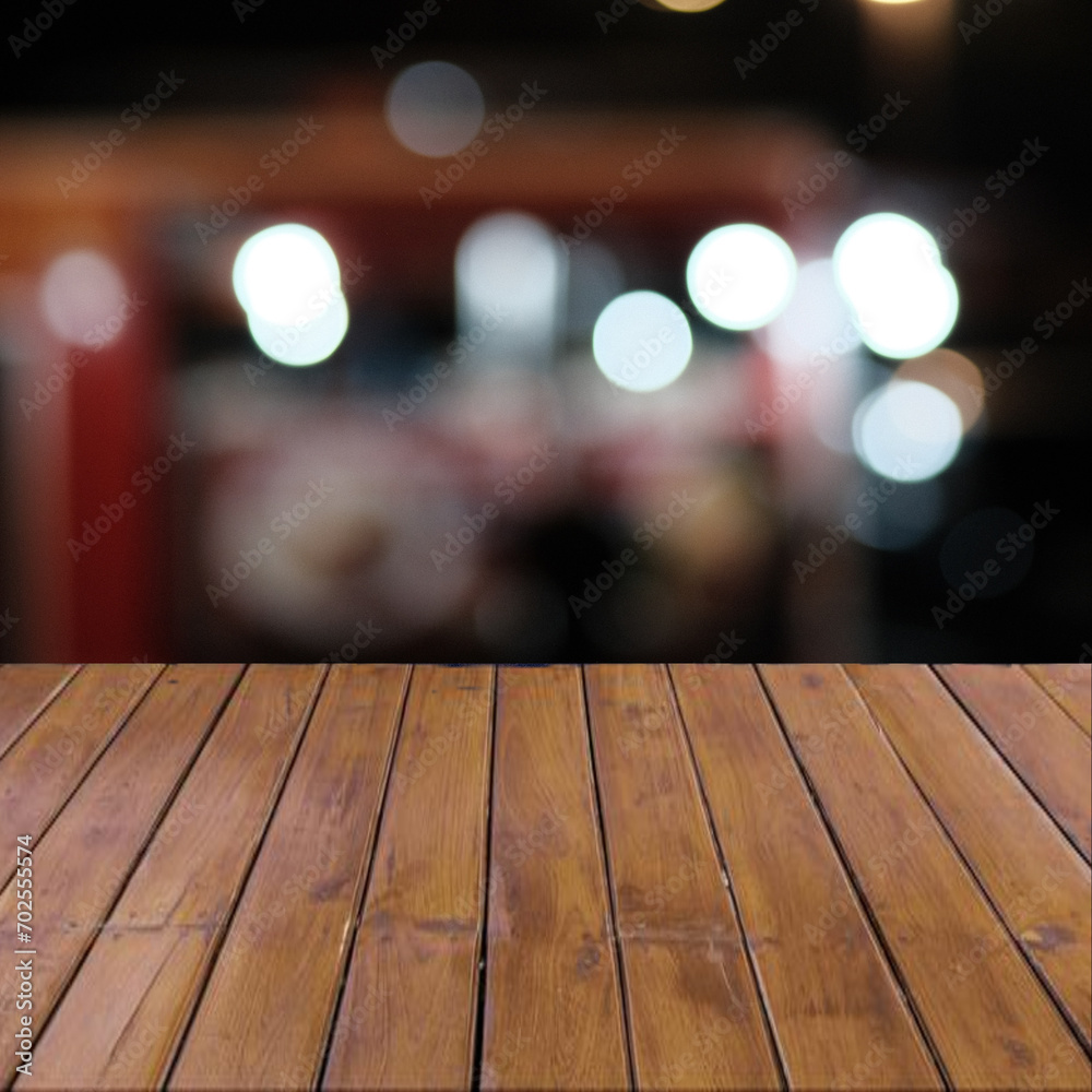 wood table top on the blur background. Empty wood table with defocused vertical table background. Ideal for product display on top of the table.