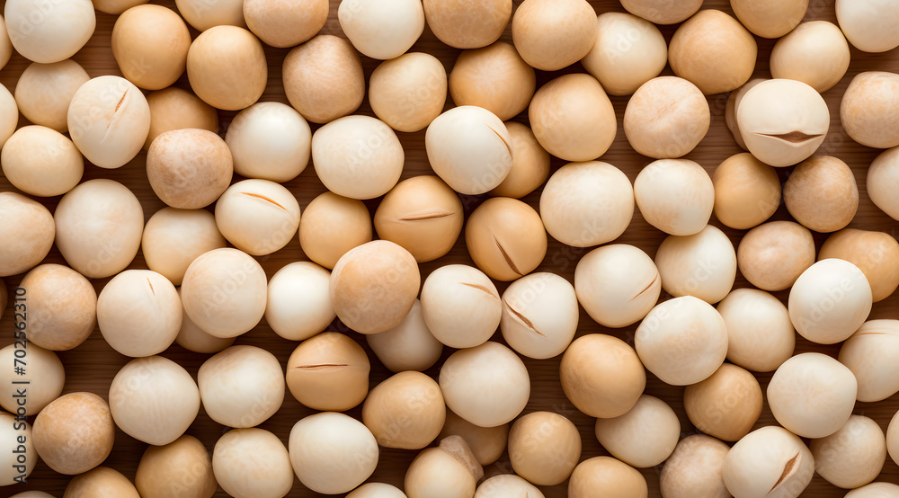Organic raw white soybeans with vibrant green leaves arranged in a top-down view, perfect for promoting plant-based diets and organic food concepts Organic raw white soybeans with vibrant green leaves arranged in a top-down view, perfect for promoting plant-based diets and organic food concepts