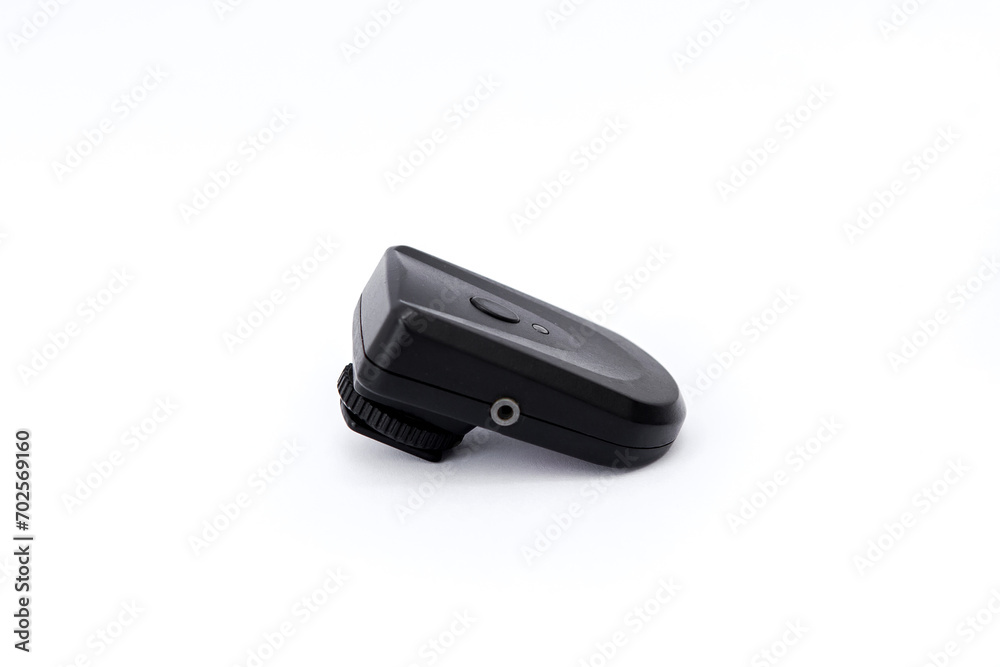 Trigger isolated on white background. This electronic tool is used in photography. High quality photos. Trigger isolated on white background. This electronic tool is used in photography. High quality photos.
