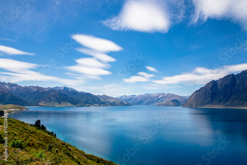 the panorama view of lake Hawea. It is in the Otago Region New Zealand, at an altitude of 348 metres. It covers 141 km² and reaches 392 metres deep.