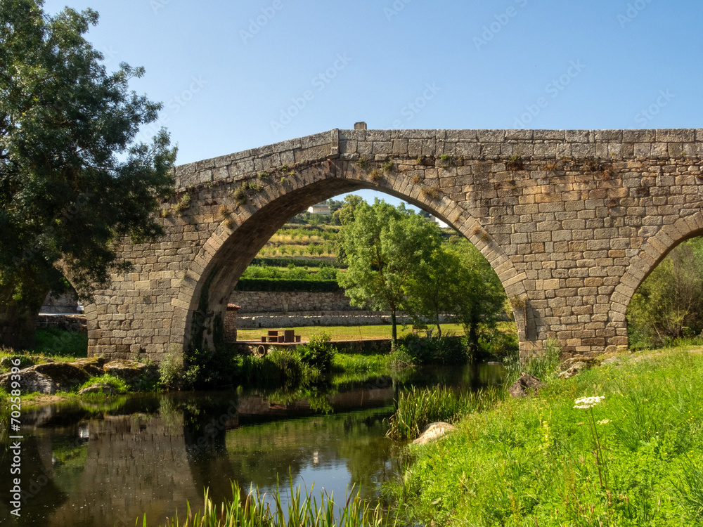 View of the Gothic bridge (15th century), in the town of Ucanha. Portugal.
