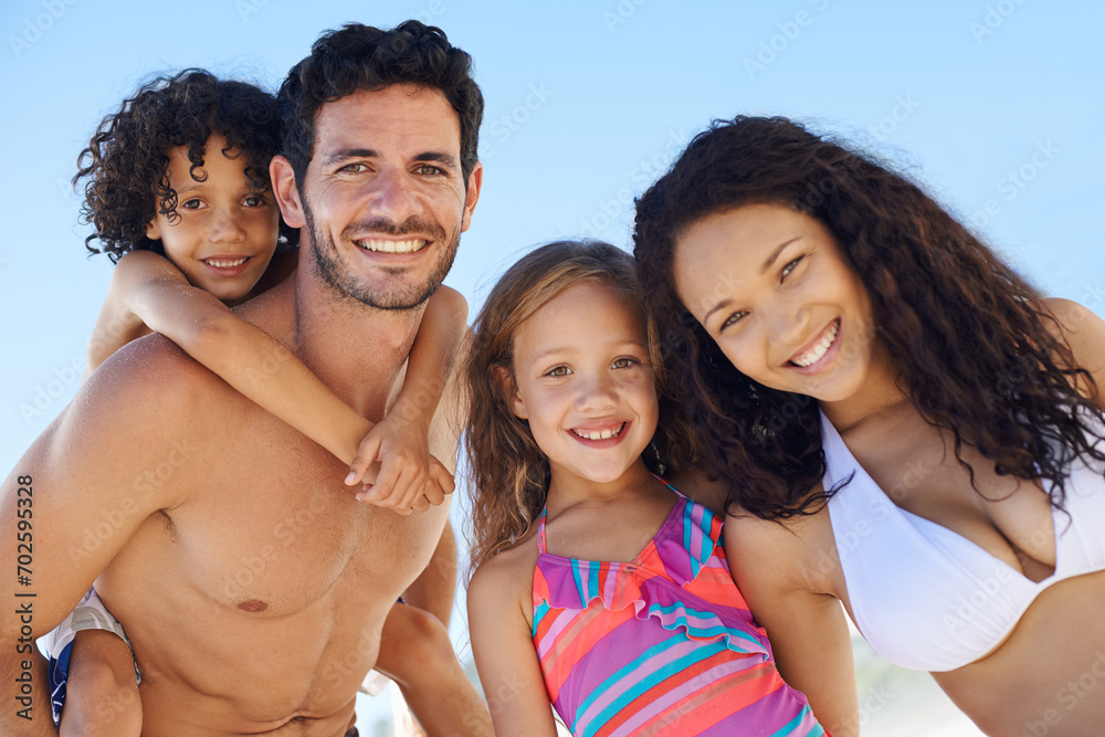Family, parents and children are happy on beach, portrait while on vacation for summer and sun in Brazil. Travel, adventure and blue sky with people in nature with smile for love and bonding outdoor Family, parents and children are happy on beach, portrait while on vacation for summer and sun in Brazil. Travel, adventure and blue sky with people in nature with smile for love and bonding outdoor