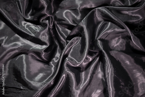 Foto Textured fabric in folds and jams, background for creativity and layouts