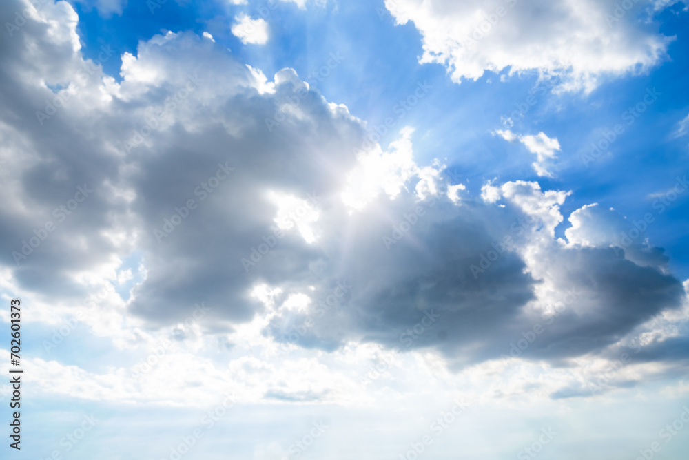Blue sky with some clouds. View over the clouds light background Blue sky with some clouds. View over the clouds light background