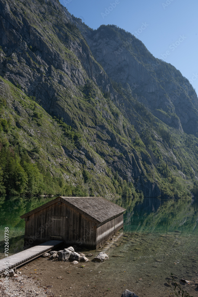 View of Obersee in Schönau am Königssee. Reflection of the mountains in the water. Germany, Europe. View of Obersee in Schönau am Königssee. Reflection of the mountains in the water. Germany, Europe.